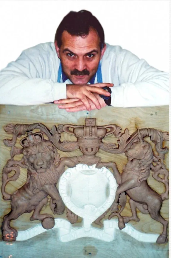 Vyacheslav (Nick) Dohuzya with the Lion and Unicorn clay model